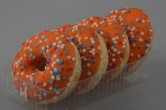 4 Oranje donuts afbeelding